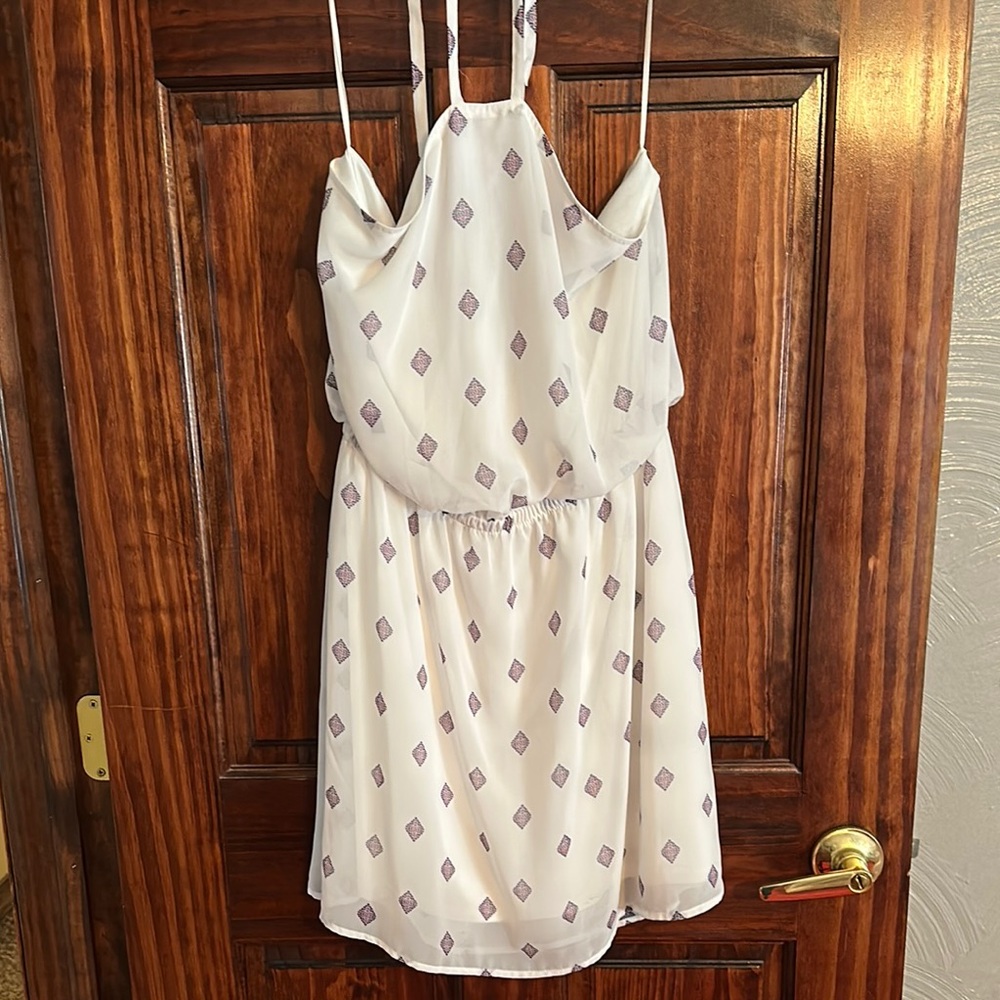 Ladies Express Cream and light purple halter dress. Size: Medium